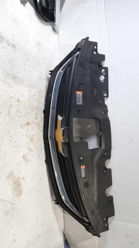 2017 Chevrolet Sonic Black Grille OEM 94538130 Used w/ Light Rock Chips