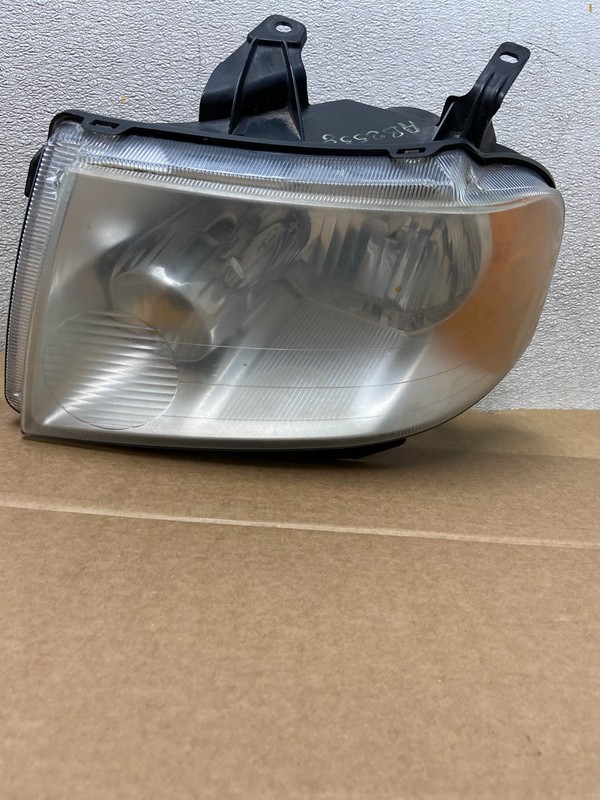 2005 - 2007 Ford Freestyle Left Driver LH Side Halogen Headlight AB2558 DW