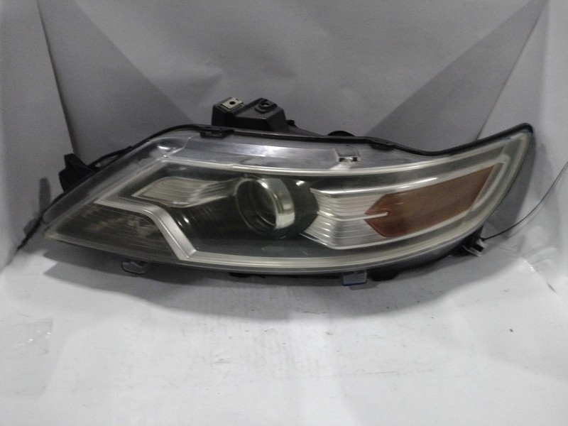 2014 Ford Taurus Left Headlight Assembly Blue OEM 706347 103K Miles