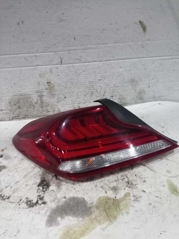 2019 Genesis G70 Left Tail Light Assembly White - Used, Chip on Edge