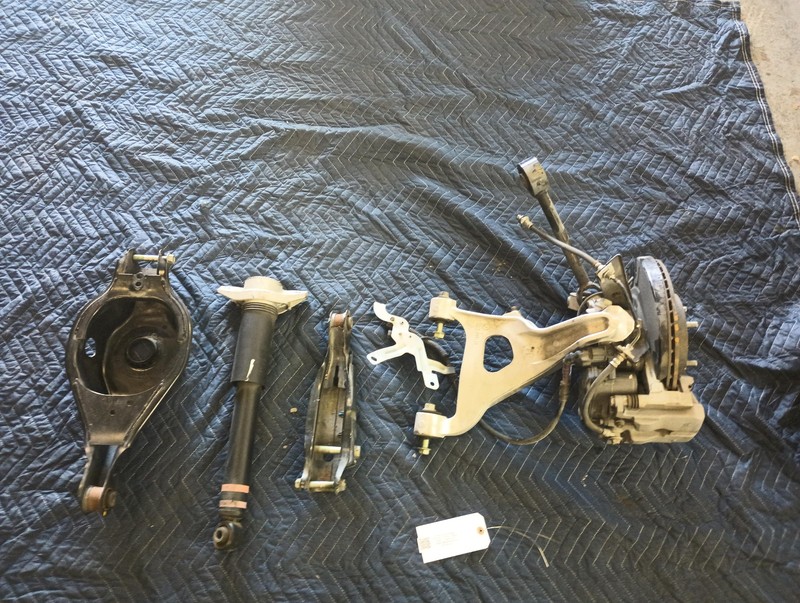 2021-2025 Nissan Rogue Right Passenger Rear Suspension Knee Japan 1.5L AWD OEM