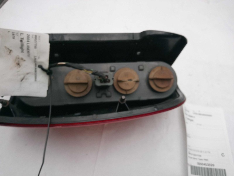 2004 Jeep Liberty Left Tail Light Assembly Tan OEM 193181 Used 264K Miles
