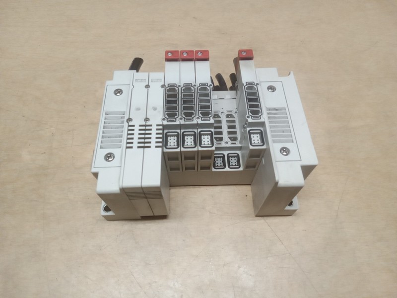 SMC SS5Y31-E4R051 Manifold Block W/ 4 SY30M-50-1A Space Assembly