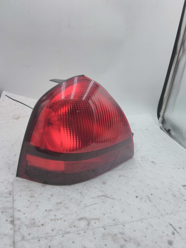 Used Left Tail Light Assembly fits: 2003 Mercury Grand marquis quarter panel mou