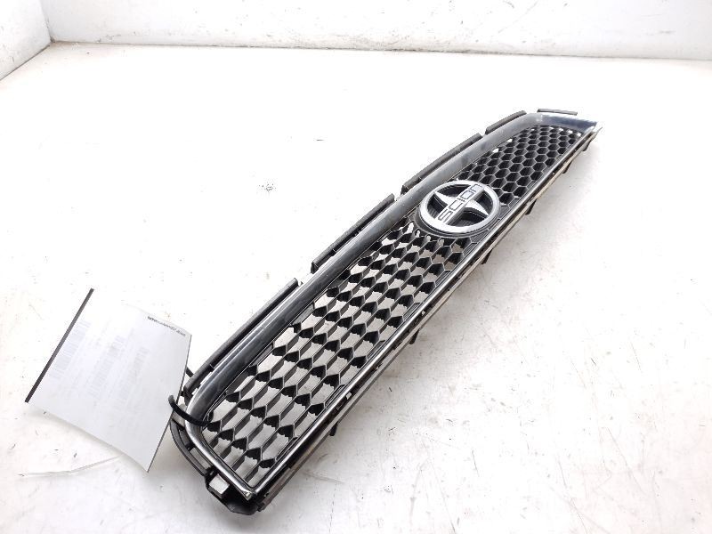 05-07 SCION TC FRONT UPPER GRILLE WITH EMBLEM