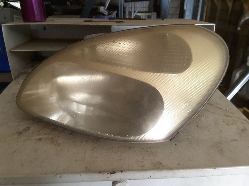 00 01 02 NUBIRA L. HEADLIGHT 64439