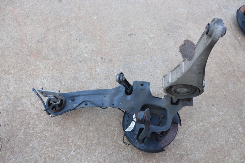2014-2017 VOLVO XC60 FWD REAR LEFT SPINDLE KNUCKLE WHEEL HUB W/ CONTROL ARM OEM