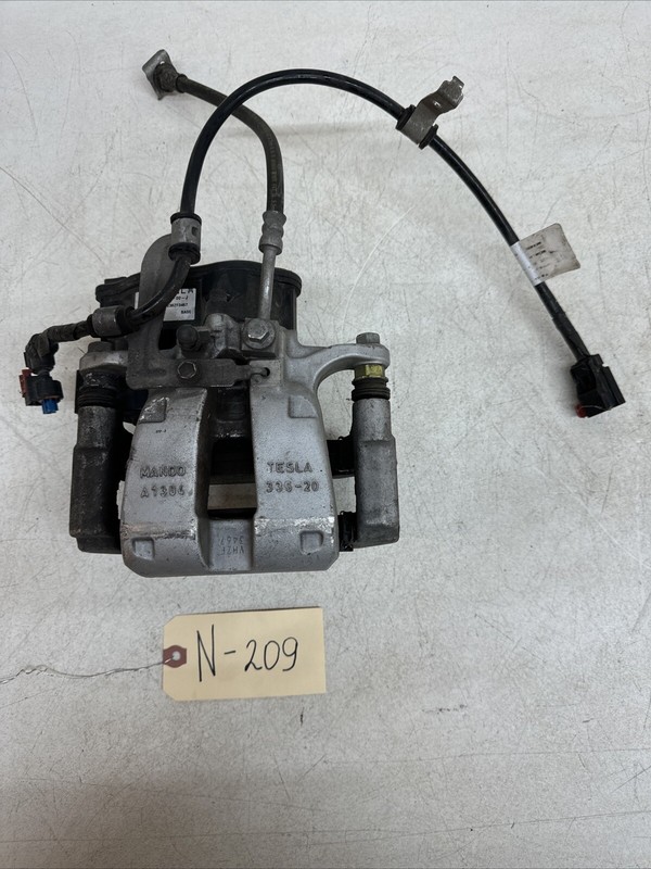 TESLA MODEL Y Performance Rear Left Brake Caliper W/ Pads 1044623-00- J 209 U 21