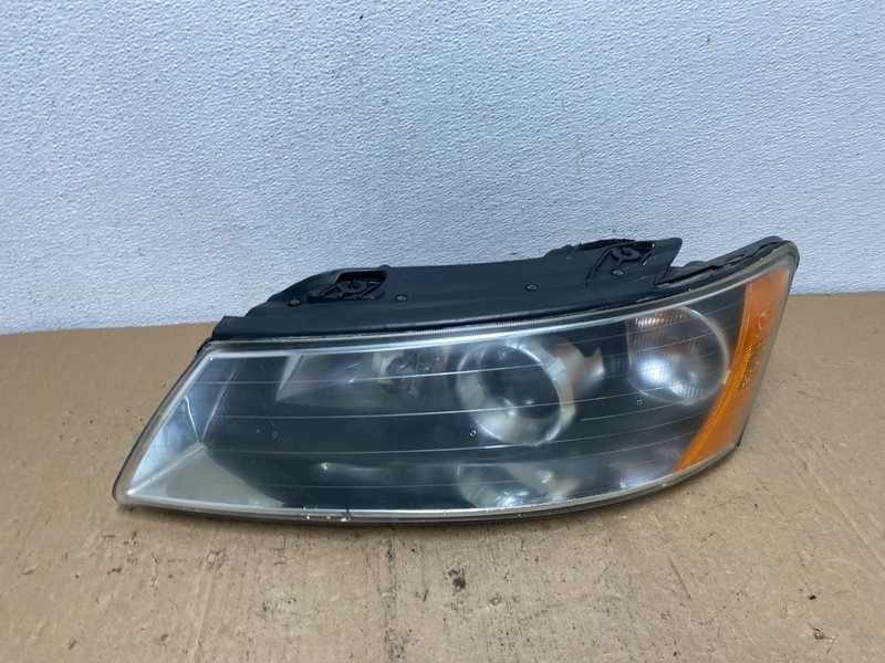 2006 to 2008 Hyundai Sonata Left Driver LH Side Headlight Halogen TYC AC6057 DW