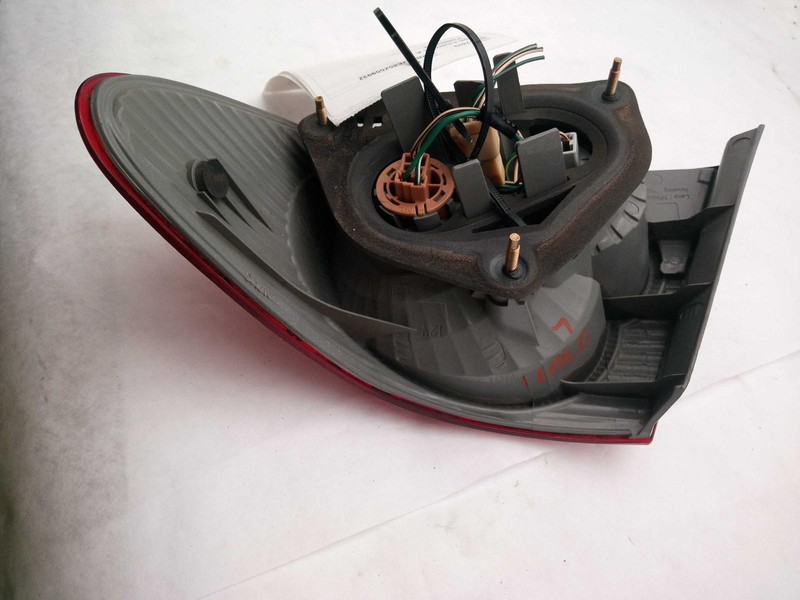 2005 Toyota Corolla Left Green Tail Light Assembly OEM Used 584109