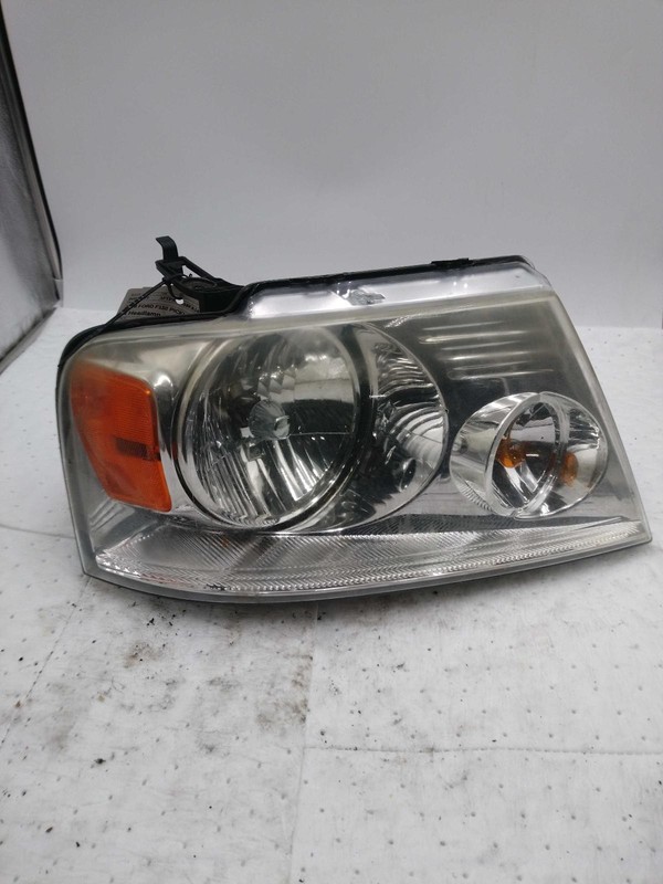 2008 Ford F150 Right Headlight Assembly Green Used - Spider Cracks & Yellow Lens