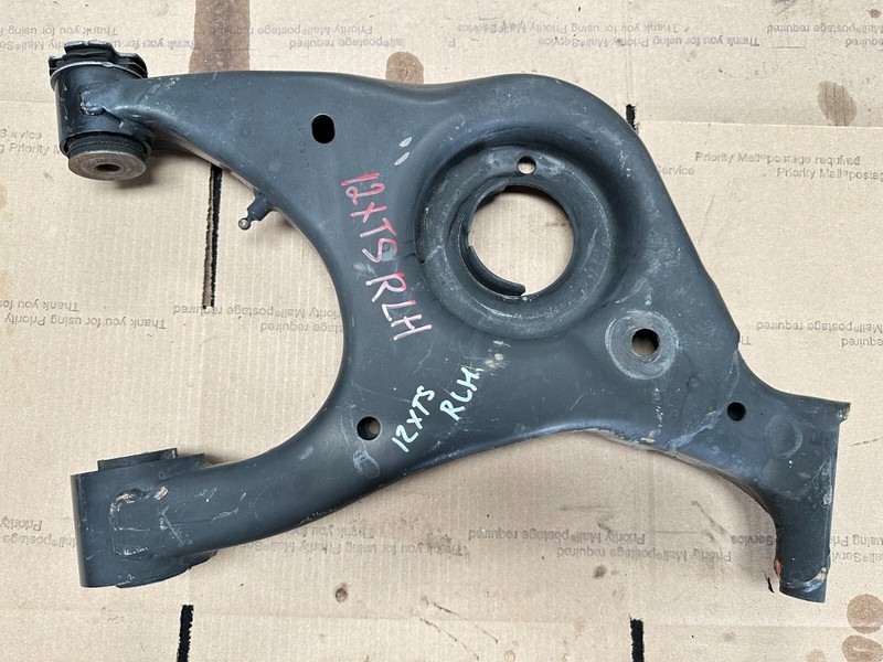 13-19 Cadillac XTS - REAR LEFT LOWER CONTROL ARM SPRING PERCH OEM