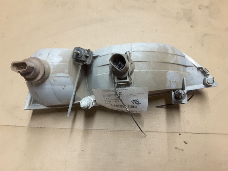 98 WINDSTAR R. HEADLIGHT 61596
