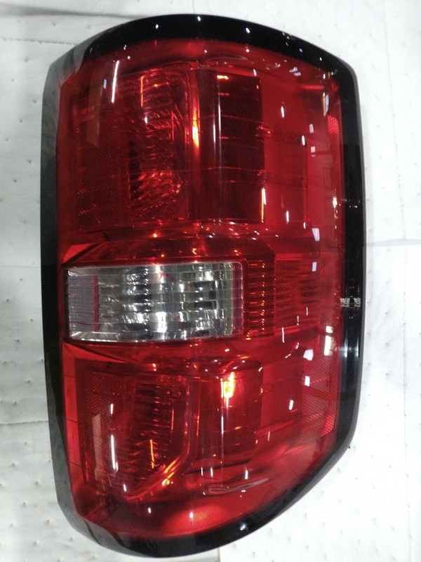 2015 GMC Sierra 1500 Left Blue Tail Light Assembly - Used, 124K Miles