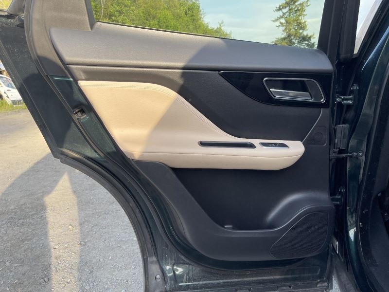 17-20 JAGUAR F-PACE LEFT REAR DOOR TRIM PANEL TAN/BLACK TC:TR45 PREMIUM 45441