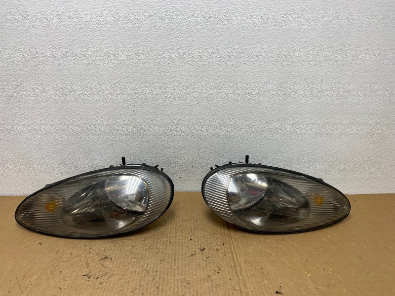 1996 to 1999 Mercury Sable Left+Right Side Set Halogen Headlights AC8121 DG