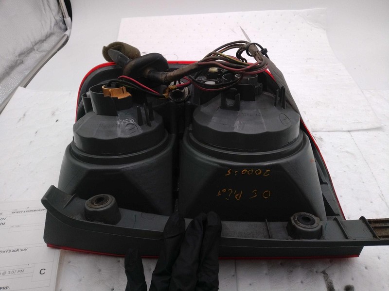 2005 Honda Pilot Left Tail Light Assembly Black OEM Used Scratches & Scuffs