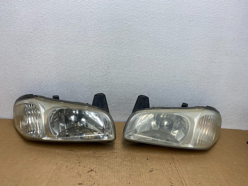 2000 to 2001 Nissan Maxima Left+Right Side Set Halogen Headlights AC7705 DW