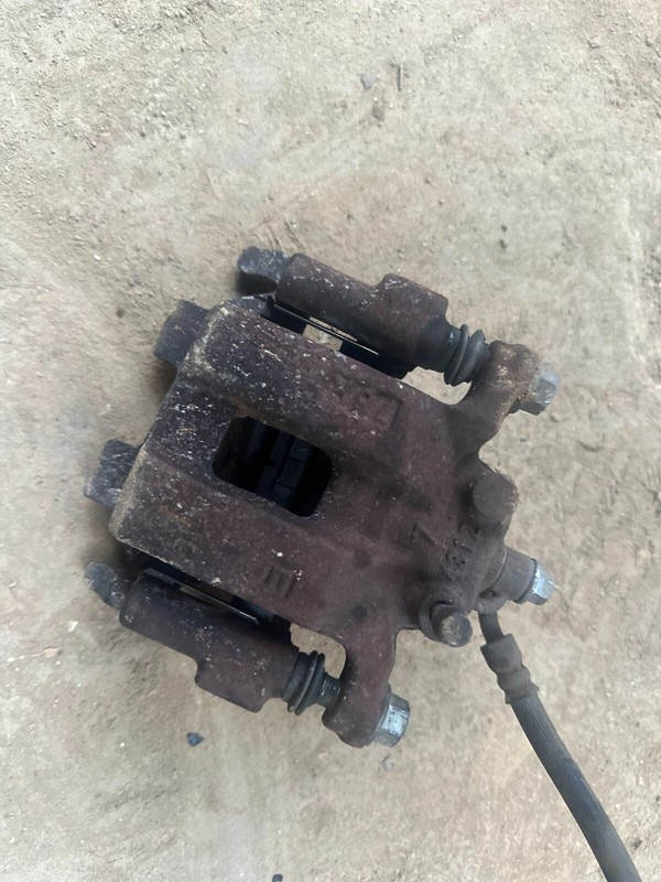 07-09 INFINITI G35 G37 SEDAN OEM LH REAR DRIVER SIDE BRAKE CALIPER W/ BRACKET