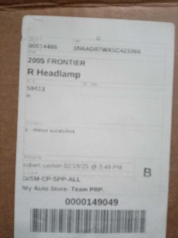 2005 Nissan Frontier Right Headlight Assembly Green OEM 447628 - Minor Scratches