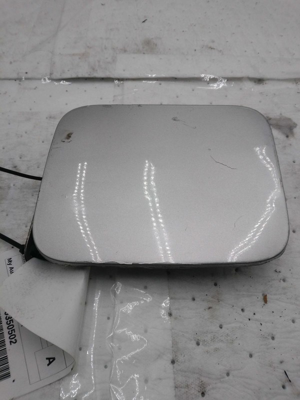 2012 Nissan JUKE Silver Fuel Filler Door OEM Used 148k Miles NJ25-23317-591000