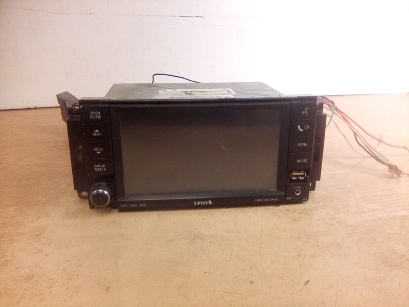Sirius MP3 WMA JPEG P05064759AC Flip Down Radio Assembly Unit