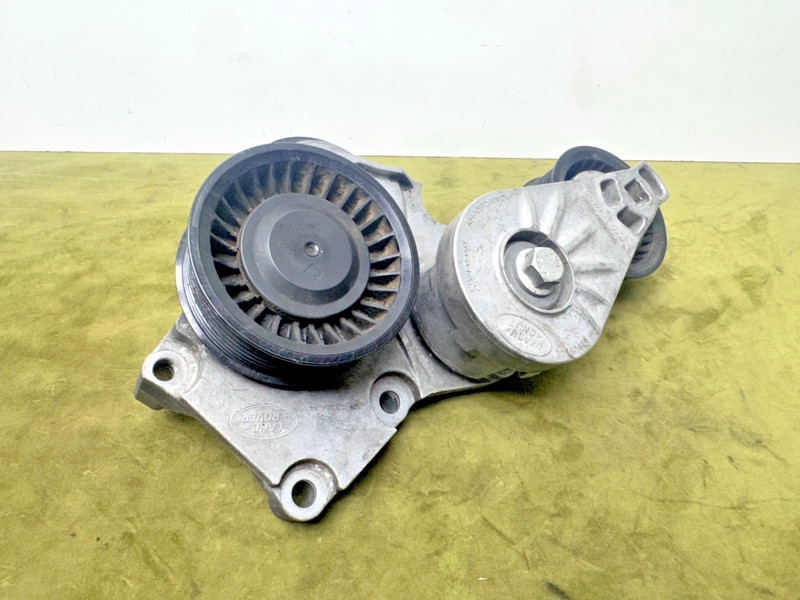 10-24 Jaguar X152 F-Type XJ XF S/C Engine Drive Belt Tensioner Idler Pulley OEM