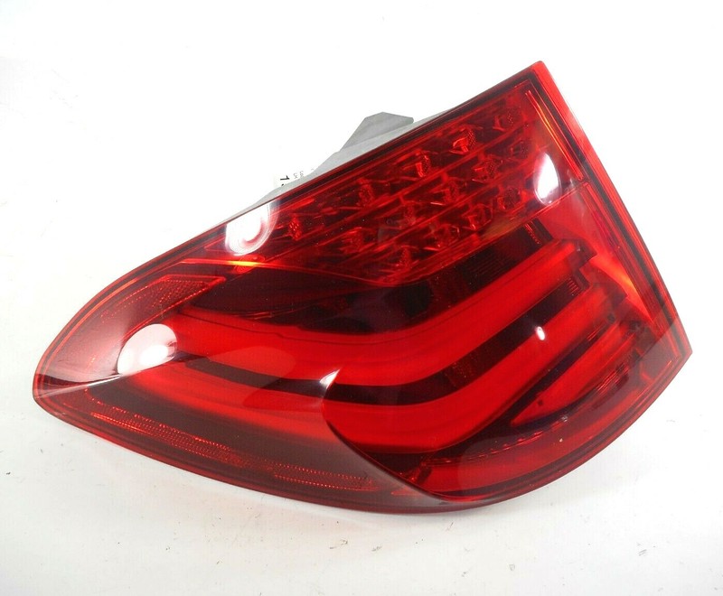10-13 BMW 550i GT F07 Tail Light Lamp Driver Left Outer Quarter Panel Mount OEM