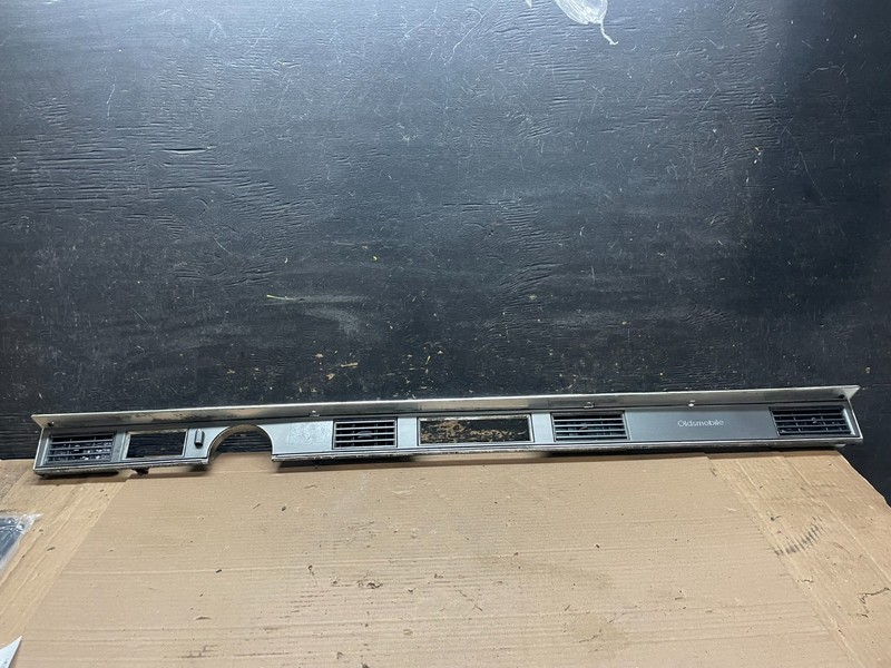 1987 - 1988 Oldsmobile Delta 88 Dashboard Center Trim Panel OEM U7837 DG