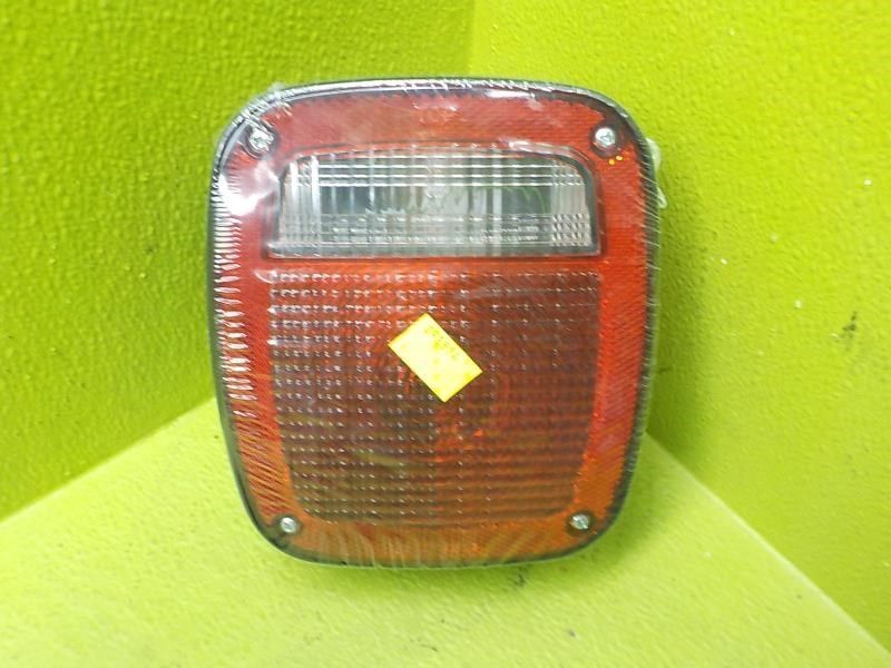 98-06 Jeep Wrangler Left Driver Tail Light Lamp OEM 56018649AD