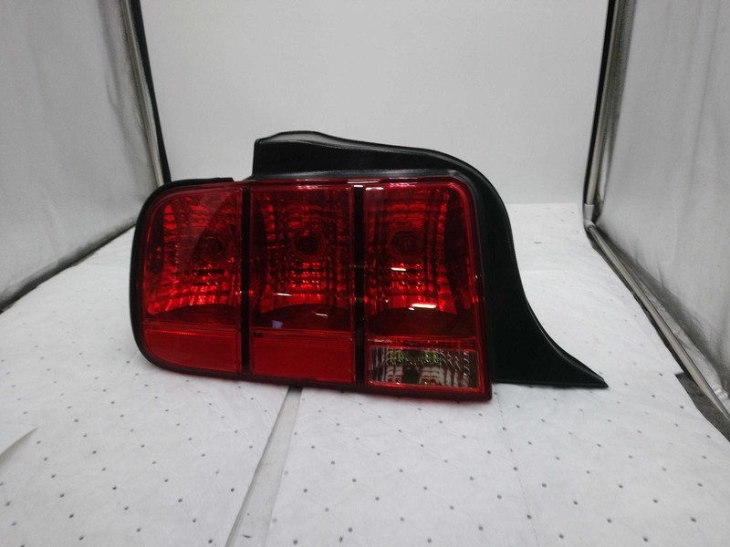 Used Left Tail Light Assembly fits: 2005 Ford Mustang Left Grade B