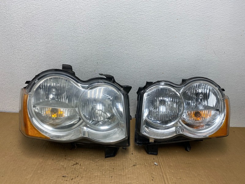 2009-2010 Jeep Grand Cherokee Left+Right Set Halogen Headlights AC7707 DW