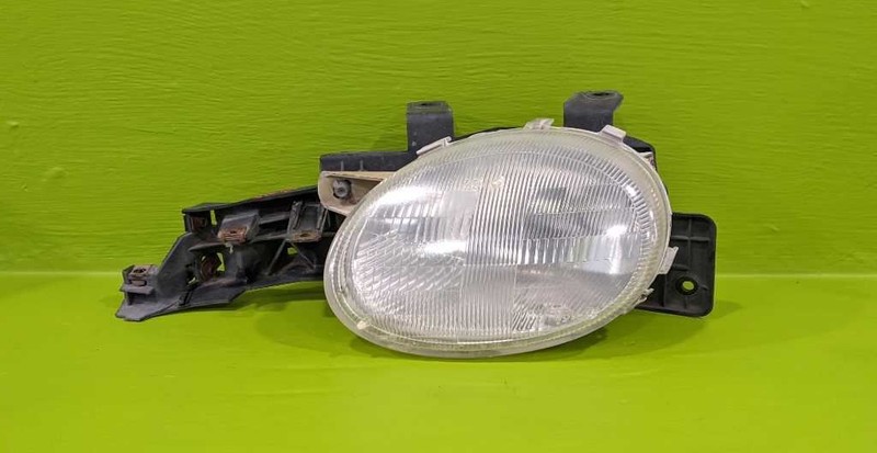 95 96 97 98 99 NEON DRIVER LEFT HEADLIGHT LAMP W/MOUNT OEM 3788-23