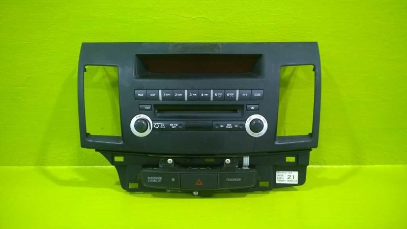 08 09 10 11 12 13 MITSUBISHI LANCER RADIO TUNER CONTROL BEZEL TRIM OEM 2877-4