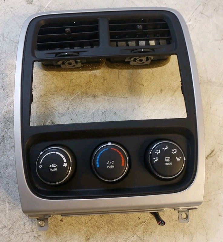 2010-2012 Dodge Caliber Dash Radio Bezel Climate Control Silver 1JW601Z2AD OEM
