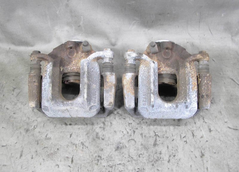 2011-2017 BMW F25 X3 F26 X4 Rear Axle Brake Caliper Pair w Brackets OEM