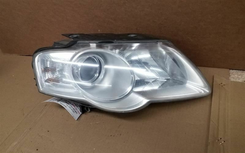 Passenger Headlight Halogen Hella Manufacturer Fits 06-09 PASSAT 224712