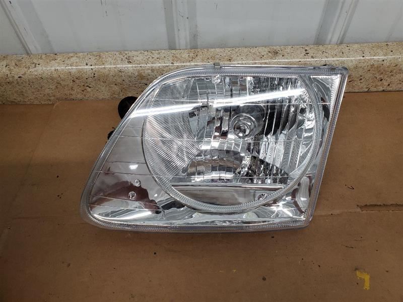 Driver Headlight Heritage Lightning Fits 01-04 FORD F150 PICKUP 281708