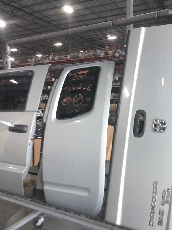 2017 Nissan Frontier Left Front Door Silver 41000 Miles OEM Replacement Part