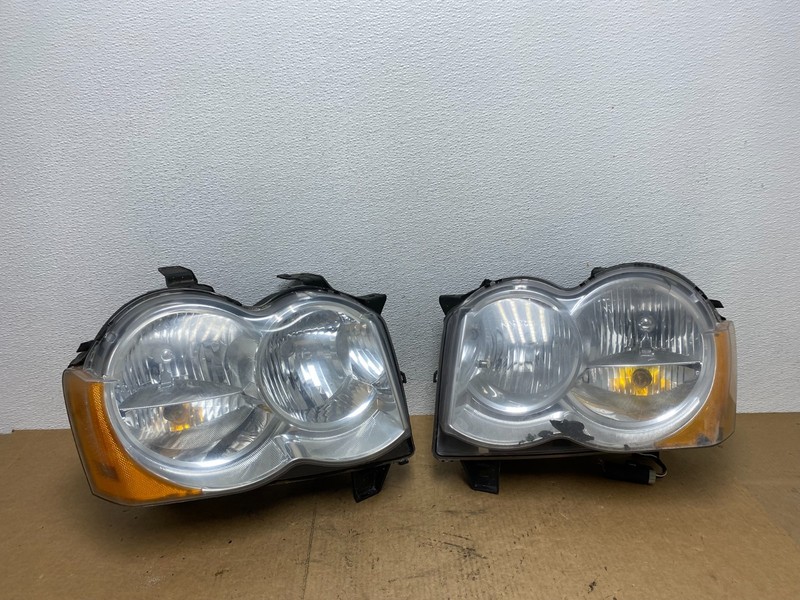 2009-2010 Jeep Grand Cherokee Left+Right Set Halogen Headlights AC3422 DW