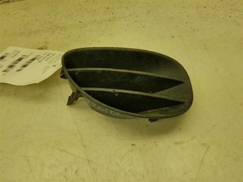 06-08 TOYOTA YARIS 1.5L FWD AT PASSENGER SIDE LOWER BUMPER FOG LIGHT COVER