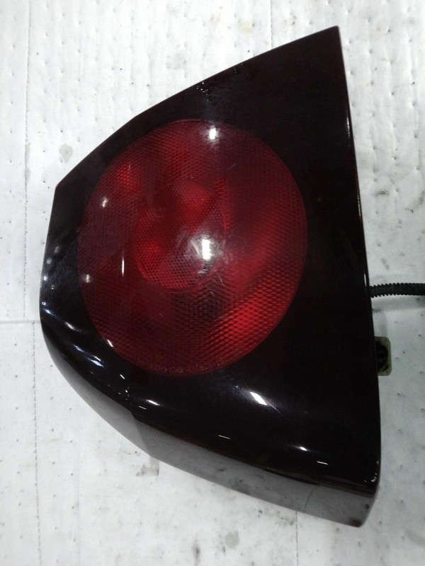 2003 Chevrolet Impala Left Tail Light Assembly Blue OEM 88375 Used
