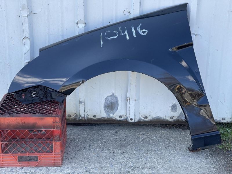 2008-2011 FORD FOCUS LEFT FENDER BLACK PC:UA 2.0L AT FWD -SE- 52970