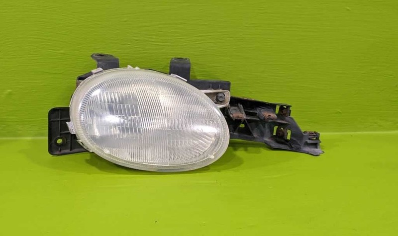 95 96 97 98 99 NEON PASSENGER RIGHT HEADLIGHT LAMP W/MOUNT OEM 3788-22
