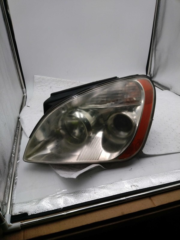 2007 Kia Rondo Left Headlight Assembly Black Yellow Lens 141K Miles NJ25-26002