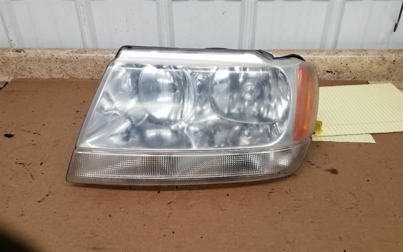 Driver Headlight Crystal Clear Fits 99-04 GRAND CHEROKEE 219378