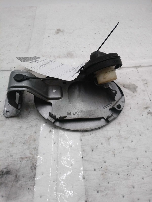 2010 Mazda 3 Grey Fuel Filler Door OEM Used 5579473 70K Miles
