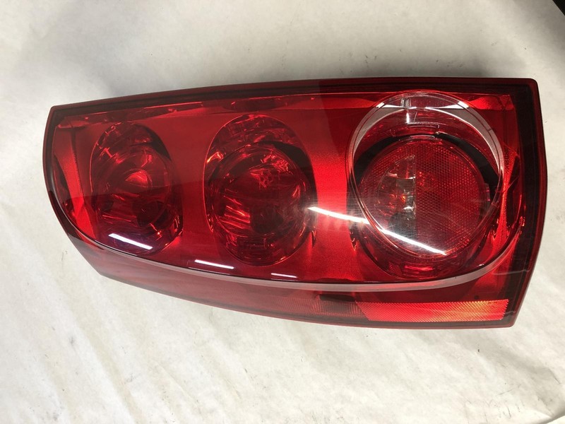 07-'11 GMC YUKON Left driver Taillight red lens OEM Grade A!