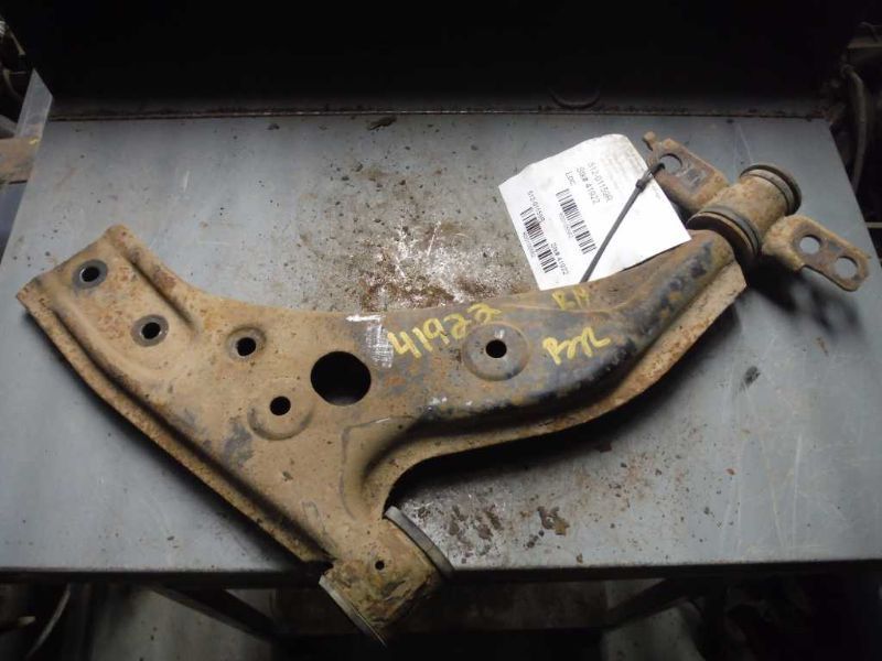 97 98 99 00 01 02 ESCORT R. LOWER CONTROL ARM FR SDN 105582