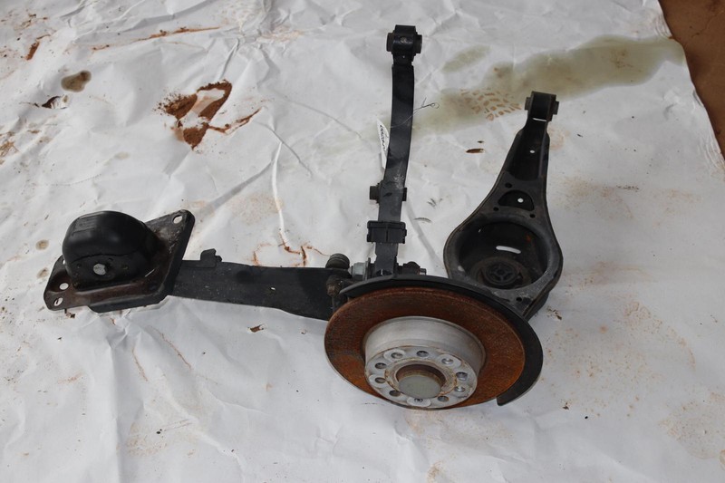 2005-2014 VOLKSWAGEN JETTA SPORTWAGEN REAR LEFT SPINDLE KNUCKLE HUB W/ ARMS OEM